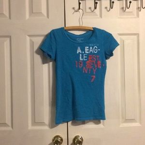 American eagle blue shirt with words on front